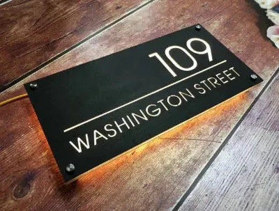 Custom black LED house letterbox sign displaying number 109 and Washington Street in illuminated white text