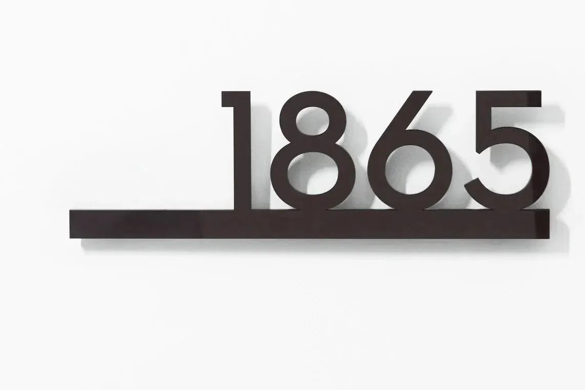 Custom modern floating house number plaque in black with a sleek, minimalist design and 3D effect.