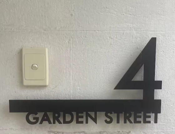 4 garden street installed on a besser block concrete wall