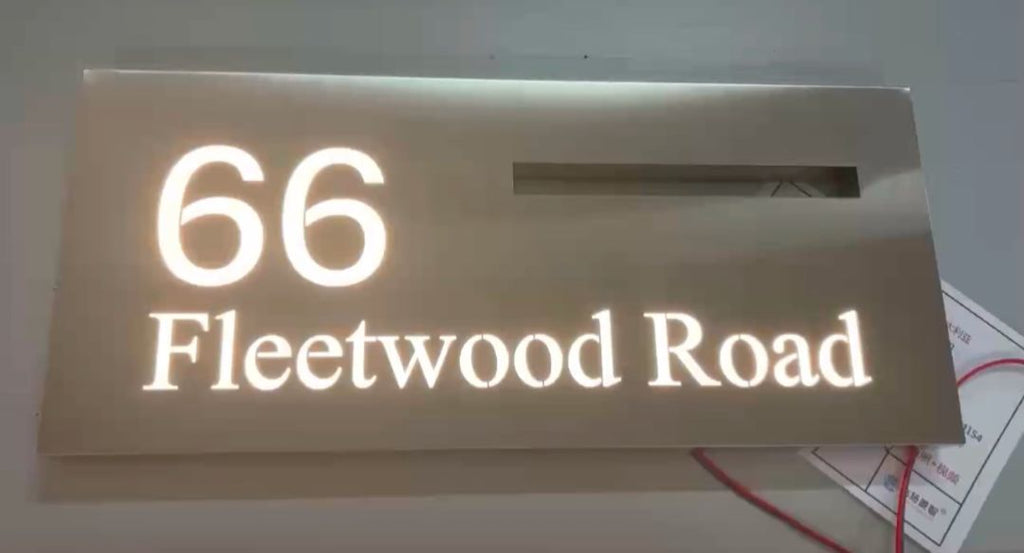 Illuminated stainless steel mailbox slot letterbox with custom LED light-up address 66 Fleetwood Road