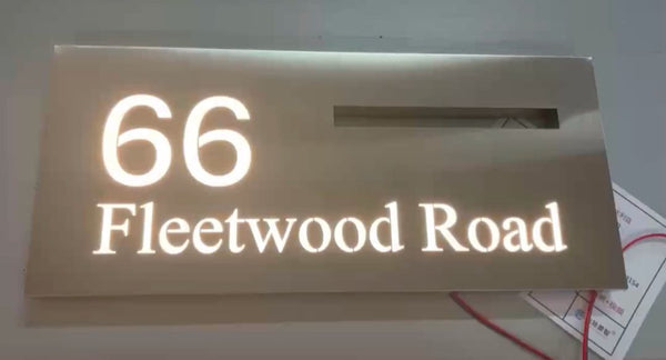 Illuminated stainless steel mailbox slot letterbox with custom LED light-up address 66 Fleetwood Road