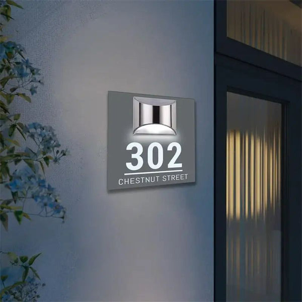 Square solar-powered acrylic house sign with illuminated address number 302 and street name Chestnut Street