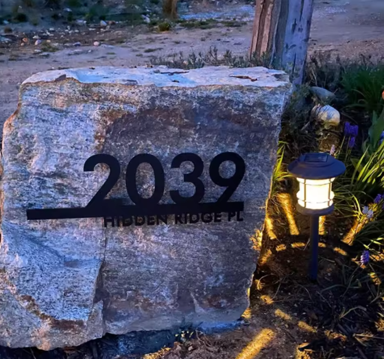 floating sign on a rock at dusk